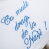Trusou bleu pentru botez de cu mesajul "Cu mult drag de la nasi", alcatuit din 7 piese. REC1403
